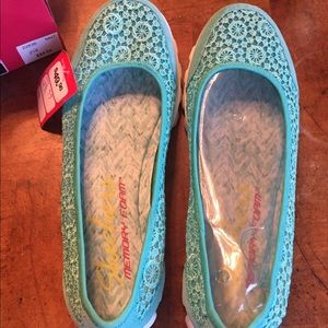 Mint-colored Skechers